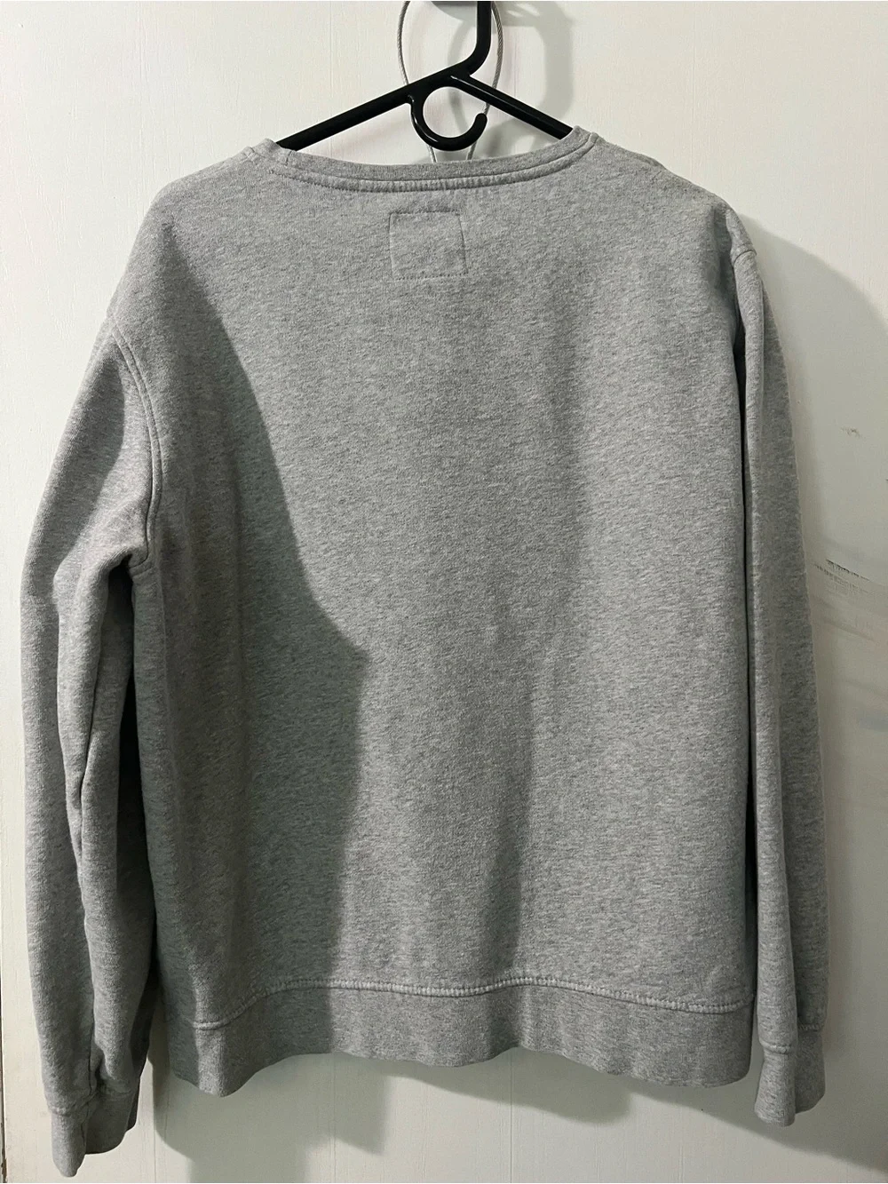 Classic Grey Crewneck Sweatshirt with Feather Patch